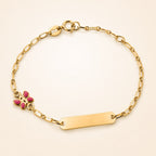 Bracciale baby con targa con soggetto farfalla smaltata