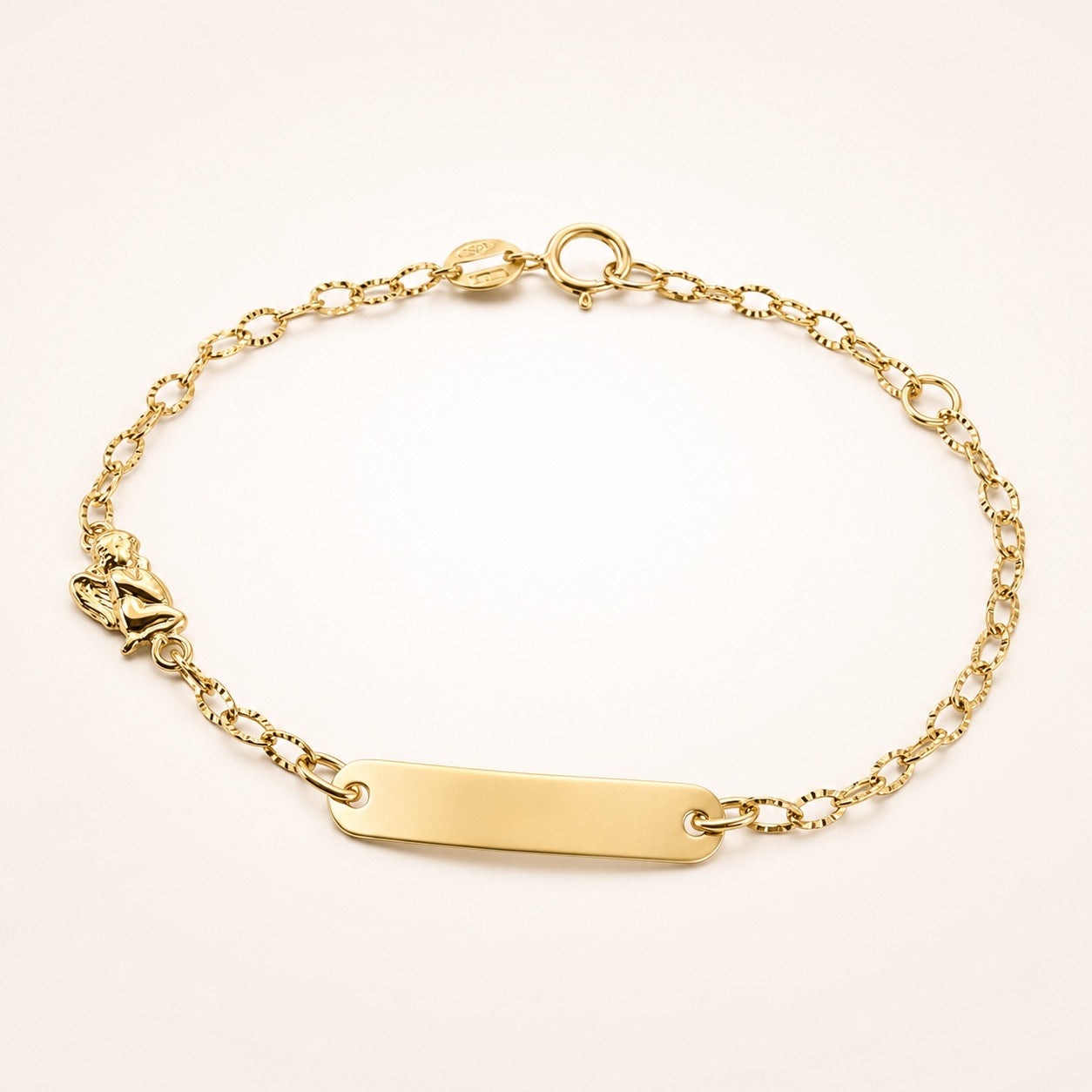 Bracciale con targa con soggetto angioletto e maglie zigrinate
