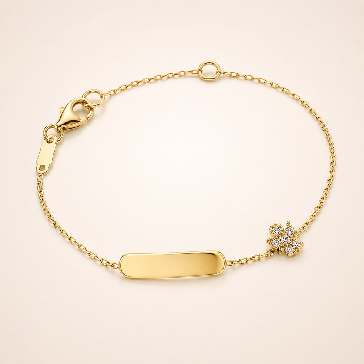Bracciale baby con targa e soggetto angelo zirconato
