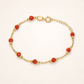Bracciale baby con corallini rossi